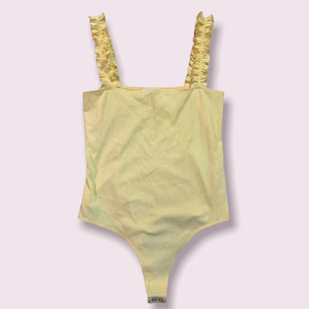 Yellow bodysuit